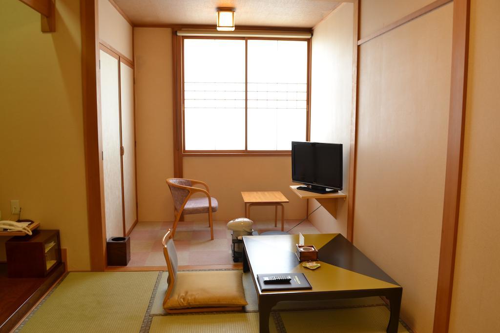 Akita Onsen Plaza Hotell Rum bild